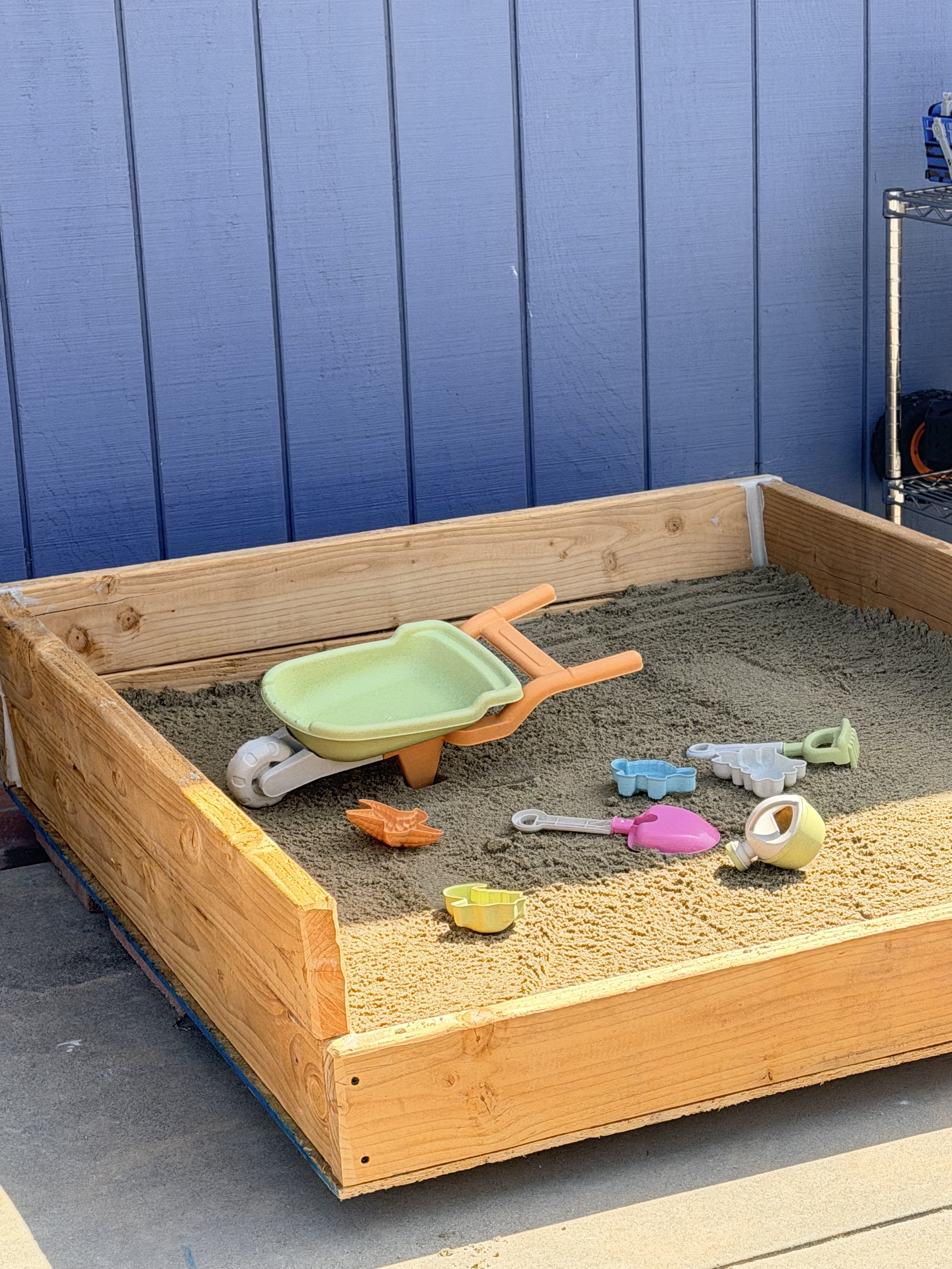 Sandbox with toys