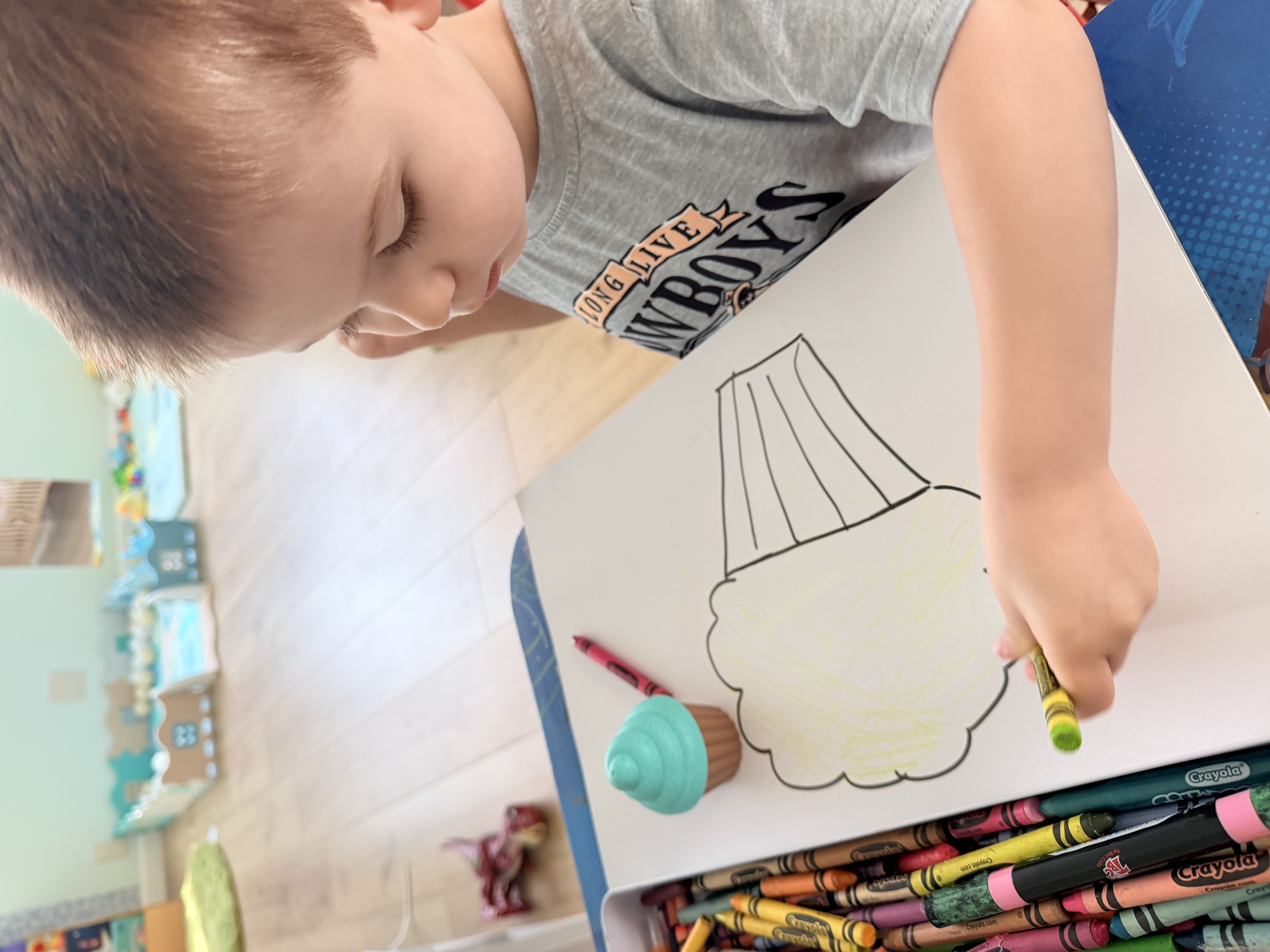 Boy doing art and colouring